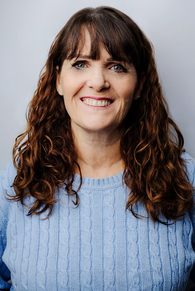 Kerry Snip, registered social worker and therapist, smiling warmly
